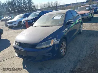 2011 Volkswagen Jetta Sedan SE w/Convenience & Sunroof with VIN 3VWDX7AJ3BM321590, listed as a IAAI auction lot 41573649 with NaN miles. Bid and sale history available at carsss.com. Image 2.