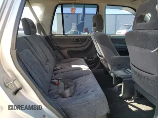 2000 Honda CR-V LX with VIN JHLRD1849YC047923, listed as a Copart auction lot 77041664 with 235,211 mi miles and Salvage Title. Bid and sale history available at carsss.com. Image 10.
