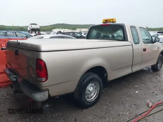 1999 Ford F-150 z VIN 1FTZX1727XNC32012, wystawiony jako IAAI lot #42503195 z przebiegiem 1 805 469 mil mil oraz . Historia ofert i sprzedaży dostępna na DreamBid. Obrazek 4.