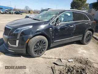 2022 Cadillac XT5 AWD Premium Luxury with VIN 1GYKNDRS7NZ164512, listed as a Copart auction lot 49236945 with 30,019 mi miles and Salvage title. Bid and sale history available at DreamBid. Image 1.