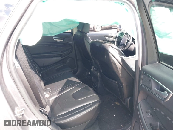 2021 Ford Edge Titanium z VIN 2FMPK3K9XMBA21766, wystawiony jako IAAI lot #42187940 z przebiegiem 79 732 mil mil oraz . Historia ofert i sprzedaży dostępna na DreamBid. Obrazek 8.