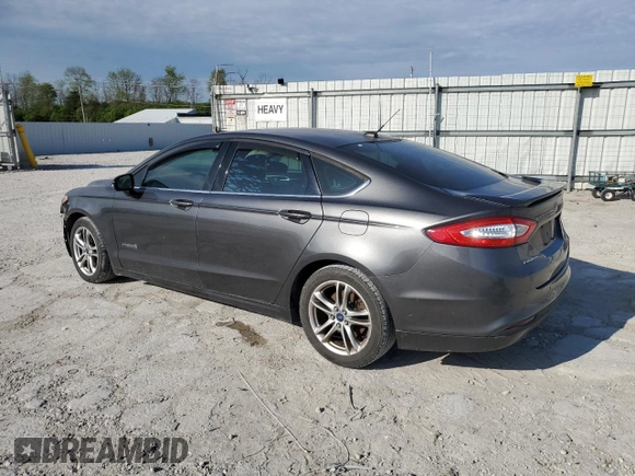 2016 Ford Fusion SE Hybrid with VIN 3FA6P0LUXGR131599, listed as a Copart auction lot 54498685 with 160,379 mi miles and Salvage title. Bid and sale history available at DreamBid. Image 2.