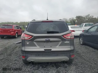 2014 Ford Escape SE with VIN 1FMCU0GX7EUA88805, listed as a Copart auction lot 51124585 with 105,518 mi miles and Salvage Title. Bid and sale history available at carsss.com. Image 6.