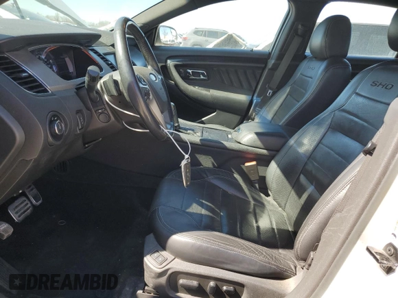 2015 Ford Taurus SHO with VIN 1FAHP2KT3FG203228, listed as a Copart auction lot 49688775 with 76,218 mi miles and Salvage Title. Bid and sale history available at DreamBid. Image 7.
