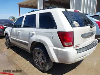 2007 Jeep Grand Cherokee Laredo with VIN 1J8HS48P37C658550, listed as a IAAI auction lot 41809384 with 1 mi miles. Bid and sale history available at carsss.com. Image 3.