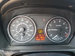 2007 BMW 3 Series 328i with VIN WBAVC53567FZ81411, listed as a Copart auction lot 56689235 with 143,823 mi miles and Salvage title. Bid and sale history available at DreamBid. Image 9.