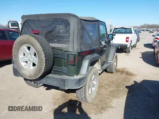 2007 Jeep Wrangler X with VIN 1J8FA24197L205095, listed as a IAAI auction lot 41388452 with 127,051 mi miles and . Bid and sale history available at carsss.com. Image 4.