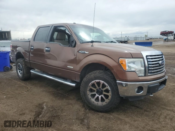2011 Ford F-150 XLT with VIN 1FTFW1ETXBFB51042, listed as a Copart auction lot 51473695 with 179,195 mi miles and Salvage Title. Bid and sale history available at carsss.com. Image 4.