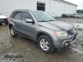 2009 Suzuki Grand Vitara z VIN JS3TD044794100716, wystawiony jako Copart lot #58739065 z przebiegiem 151 638 mil mil oraz Szkoda całkowita • Salvage title. Historia ofert i sprzedaży dostępna na DreamBid. Obrazek 4.