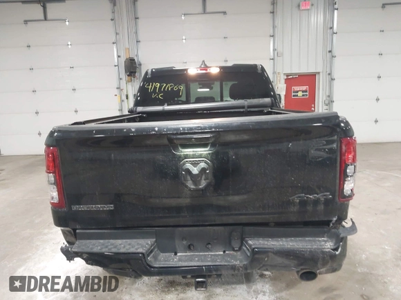 2022 Ram 1500 Big Horn z VIN 1C6SRFBT2NN281888, wystawiony jako IAAI lot #41971869 z przebiegiem 112 527 mil mil oraz . Historia ofert i sprzedaży dostępna na DreamBid. Obrazek 16.