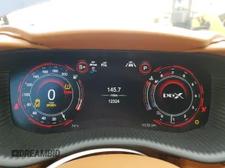 2021 Aston Martin DBX z VIN SCFVUJAW7MTV03341, wystawiony jako Copart lot #71015804 z przebiegiem 12 324 mil mil oraz Szkody całkowita. Historia ofert i sprzedaży dostępna na DreamBid. Obrazek 9.