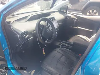 2021 Toyota Prius L Eco with VIN JTDKAMFUXM3134462, listed as a IAAI auction lot 42450931 with 89,239 mi miles and . Bid and sale history available at DreamBid. Image 5.