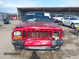 1999 Jeep Cherokee Sport with VIN 1J4FT68S4XL613395, listed as a IAAI auction lot 42316934 with 142,838 mi miles and . Bid and sale history available at DreamBid. Image 13.
