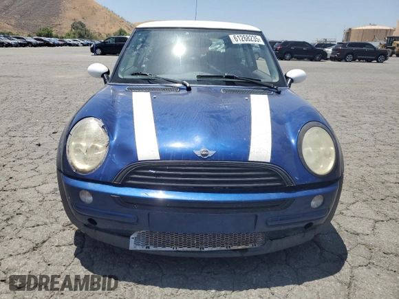 2004 MINI Hardtop z VIN WMWRC334X4TC51451, wystawiony jako Copart lot #61268235 z przebiegiem 149 750 mil mil oraz Szkoda całkowita • Salvage title. Historia ofert i sprzedaży dostępna na DreamBid. Obrazek 5.