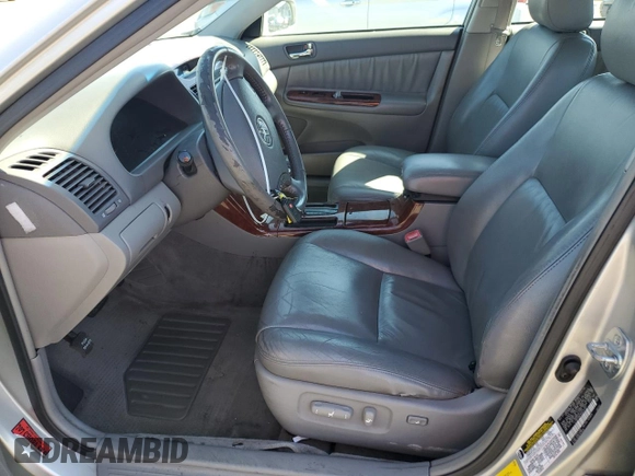 2006 Toyota Camry LE z VIN 4T1BF30KX6U630387, wystawiony jako Copart lot #49624755 z przebiegiem 232 568 mil mil oraz Szkoda całkowita • Salvage title. Historia ofert i sprzedaży dostępna na DreamBid. Obrazek 7.