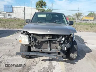 2004 Nissan Frontier XE z VIN 1N6ED27T84C446582, wystawiony jako IAAI lot #41428931 z przebiegiem Nie podano mil oraz . Historia ofert i sprzedaży dostępna na DreamBid. Obrazek 6.
