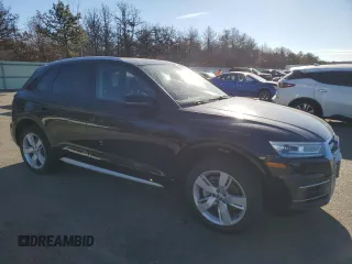 2018 Audi Q5 Premium with VIN WA1ANAFY5J2006403, listed as a Copart auction lot 87045534 with 99,215 mi miles and Salvage title. Bid and sale history available at DreamBid. Image 4.