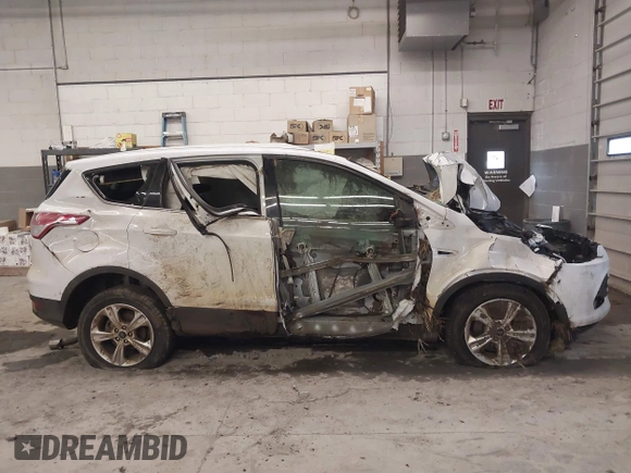 2013 Ford Escape SE with VIN 1FMCU9GX8DUC68815, listed as a IAAI auction lot 42028850 with 83,297 mi miles and . Bid and sale history available at DreamBid. Image 13.