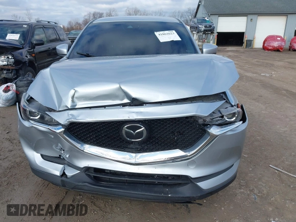 2020 Mazda CX-5 Touring with VIN JM3KFACM5L0768371, listed as a IAAI auction lot 41862623 with 138,446 mi miles and . Bid and sale history available at carsss.com. Image 12.