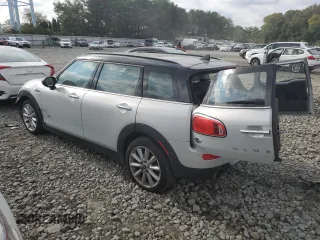 2018 MINI Clubman Cooper with VIN WMWLU1C52J2F29454, listed as a Copart auction lot 74735814 with 101,013 mi miles and Salvage Title. Bid and sale history available at carsss.com. Image 2.