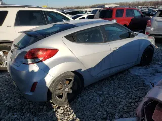 2015 Hyundai Veloster z VIN KMHTC6AD9FU236037, wystawiony jako Copart lot #43710405 z przebiegiem 130 254 mil mil oraz Czysty tytuł • Clean title. Historia ofert i sprzedaży dostępna na DreamBid. Obrazek 3.
