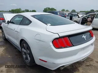 2016 Ford Mustang V6 z VIN 1FA6P8AMXG5292619, wystawiony jako IAAI lot #42088066 z przebiegiem 101 905 mil mil oraz . Historia ofert i sprzedaży dostępna na DreamBid. Obrazek 3.