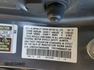 2010 Honda Insight EX z VIN JHMZE2H73AS034380, wystawiony jako Copart lot #49178935 z przebiegiem 214 256 mil mil oraz Szkoda całkowita • Salvage title. Historia ofert i sprzedaży dostępna na DreamBid. Obrazek 12.