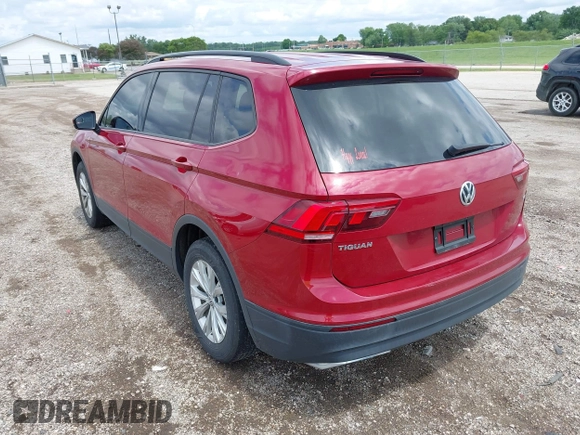 2018 Volkswagen Tiguan S with VIN 3VV1B7AX3JM045193, listed as a IAAI auction lot 42311886 with 69,049 mi miles and . Bid and sale history available at DreamBid. Image 3.