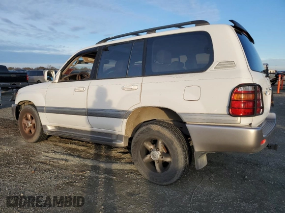 2000 Toyota Land Cruiser z VIN JT3HT05J0Y0122711, wystawiony jako Copart lot #86929954 z przebiegiem Nie podano mil oraz Czysty tytuł • Clean title. Historia ofert i sprzedaży dostępna na DreamBid. Obrazek 2.