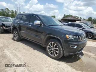 2018 Jeep Grand Cherokee Sterling z VIN 1C4RJEBG4JC241944, wystawiony jako Copart lot #61679565 z przebiegiem 83 480 mil mil oraz Szkoda całkowita • Salvage title. Historia ofert i sprzedaży dostępna na DreamBid. Obrazek 4.