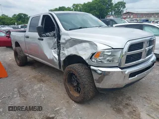 2012 Ram 2500 ST with VIN 3C6UD5CL5CG334735, listed as a IAAI auction lot 42439552 with 155,548 mi miles and . Bid and sale history available at DreamBid. Image 1.