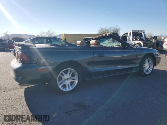 1998 Ford Mustang GT with VIN 1FAFP45X4WF216691, listed as a Copart auction lot 79389084 with 101,980 mi miles and Salvage Title. Bid and sale history available at carsss.com. Image 3.