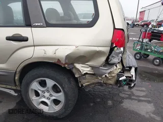 2003 Subaru Forester XS with VIN JF1SG65663H753306, listed as a IAAI auction lot 41311689 with 253,269 mi miles. Bid and sale history available at carsss.com. Image 6.