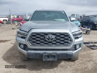 2023 Toyota Tacoma 4WD SR with VIN 3TMCZ5AN0PM609672, listed as a IAAI auction lot 41830191 with 24,244 mi miles. Bid and sale history available at carsss.com. Image 12.