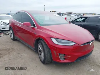 2018 Tesla Model X 75D with VIN 5YJXCAE28JF090510, listed as a IAAI auction lot 41254198 with 80,514 mi miles. Bid and sale history available at carsss.com. Image 1.