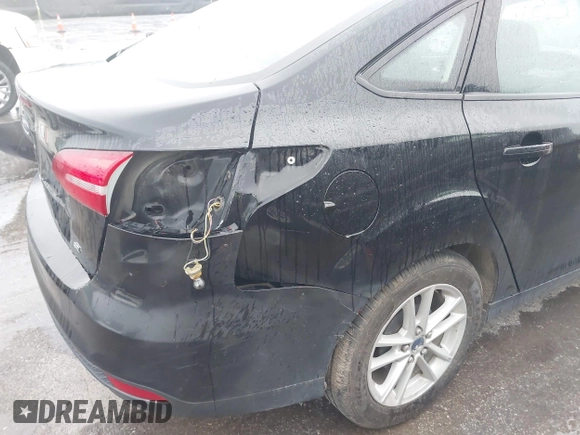 2016 Ford Focus SE with VIN 1FADP3F22GL229348, listed as a IAAI auction lot 42169543 with 173,818 mi miles and . Bid and sale history available at DreamBid. Image 6.