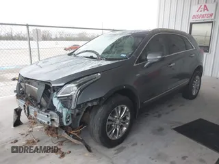 2020 Cadillac XT5 Premium Luxury FWD with VIN 1GYKNCRS4LZ152261, listed as a IAAI auction lot 41300929 with 53,709 mi miles. Bid and sale history available at carsss.com. Image 2.