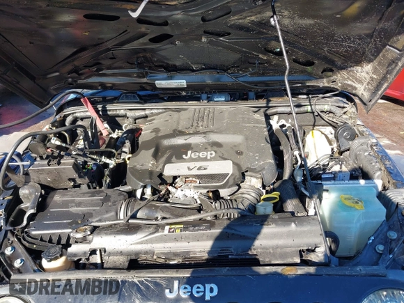 2017 Jeep Wrangler Sport with VIN 1C4GJWAG9HL567022, listed as a IAAI auction lot 40900310 with 81,196 mi miles and . Bid and sale history available at DreamBid. Image 10.