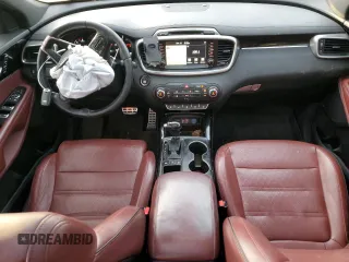 2016 Kia Sorento SXL z VIN 5XYPKDA16GG001293, wystawiony jako Copart lot #85128944 z przebiegiem 121 180 mil mil oraz Szkoda całkowita • Salvage title. Historia ofert i sprzedaży dostępna na DreamBid. Obrazek 8.