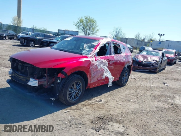 2019 Mazda CX-5 Sport with VIN JM3KFBBM6K1596402, listed as a IAAI auction lot 41971766 with 60,396 mi miles and . Bid and sale history available at DreamBid. Image 22.