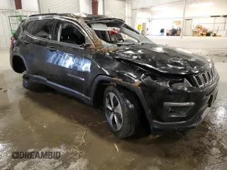 2018 Jeep Compass Latitude with VIN 3C4NJDBB1JT259366, listed as a Copart auction lot 48761085 with 56,190 mi miles and Salvage Title. Bid and sale history available at DreamBid. Image 4.