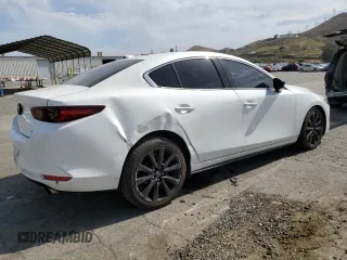 2022 Mazda 3 2.5 Turbo с VIN 3MZBPBAY9NM302022, выставлен на аукционе Copart как лот 56648605 с пробегом 51 785 миль миль и Списание • Salvage title. История ставок и продаж доступна на DreamBid. Изображение 3.