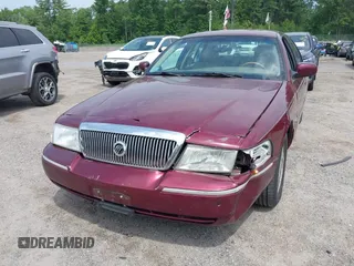 2005 Mercury Grand Marquis LS Premium z VIN 2MEHM75W05X636003, wystawiony jako IAAI lot #42480277 z przebiegiem 224 789 mil mil oraz . Historia ofert i sprzedaży dostępna na DreamBid. Obrazek 6.