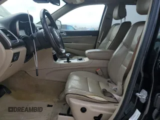 2015 Jeep Grand Cherokee Overland with VIN 1C4RJFCT6FC628729, listed as a Copart auction lot 44979155 with 105,959 mi miles and Salvage Title. Bid and sale history available at DreamBid. Image 7.