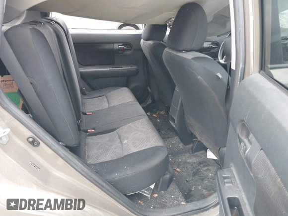 2014 Scion xB with VIN JTLZE4FE9EJ050596, listed as a IAAI auction lot 41884572 with 141,896 mi miles. Bid and sale history available at carsss.com. Image 8.