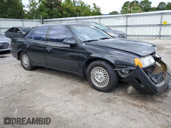 1989 Ford Taurus z VIN 1FABP54Y5KA202935, wystawiony jako Copart lot #59355304 z przebiegiem 67 510 mil mil oraz Szkoda całkowita • Salvage title. Historia ofert i sprzedaży dostępna na DreamBid. Obrazek 4.