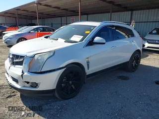 2011 Cadillac SRX Premium Collection with VIN 3GYFNCEY2BS624867, listed as a IAAI auction lot 41273945 with 209,296 mi miles. Bid and sale history available at carsss.com. Image 2.