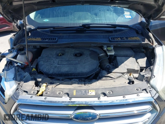 2017 Ford Escape Titanium with VIN 1FMCU0J97HUE07747, listed as a IAAI auction lot 41977788 with 104,560 mi miles. Bid and sale history available at carsss.com. Image 10.