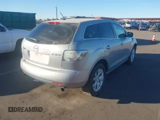 2009 Mazda CX-7 Sport with VIN JM3ER293190233927, listed as a IAAI auction lot 41054654 with 103,137 mi miles. Bid and sale history available at carsss.com. Image 4.