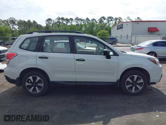 2018 Subaru Forester z VIN JF2SJABC5JH444739, wystawiony jako IAAI lot #42123918 z przebiegiem 124 520 mil mil oraz . Historia ofert i sprzedaży dostępna na DreamBid. Obrazek 14.